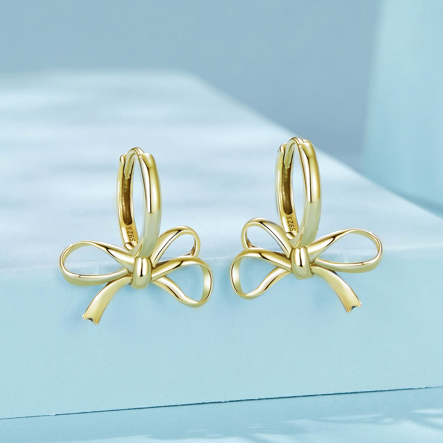 Gold Dangly Bow Earrings