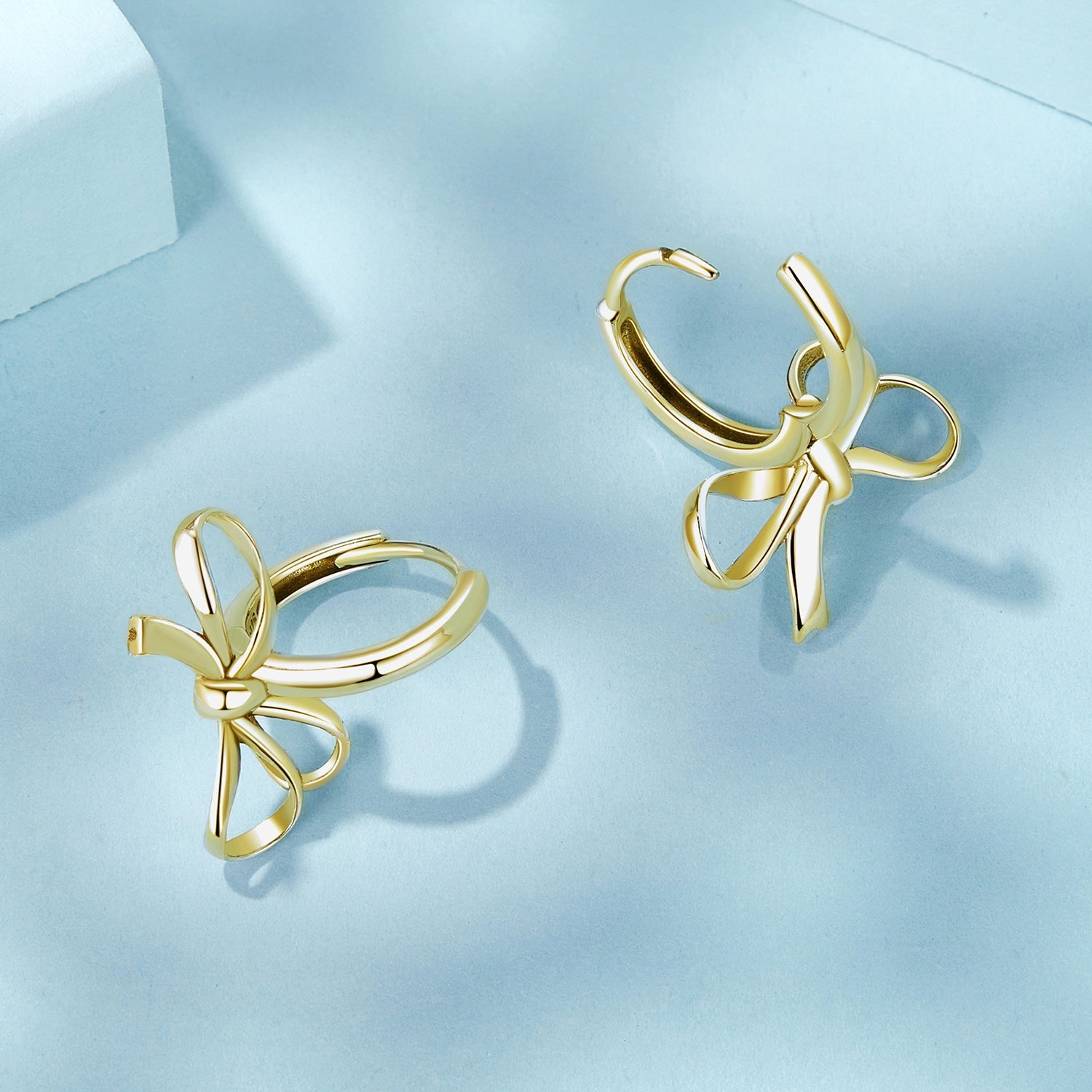 Gold Dangly Bow Earrings