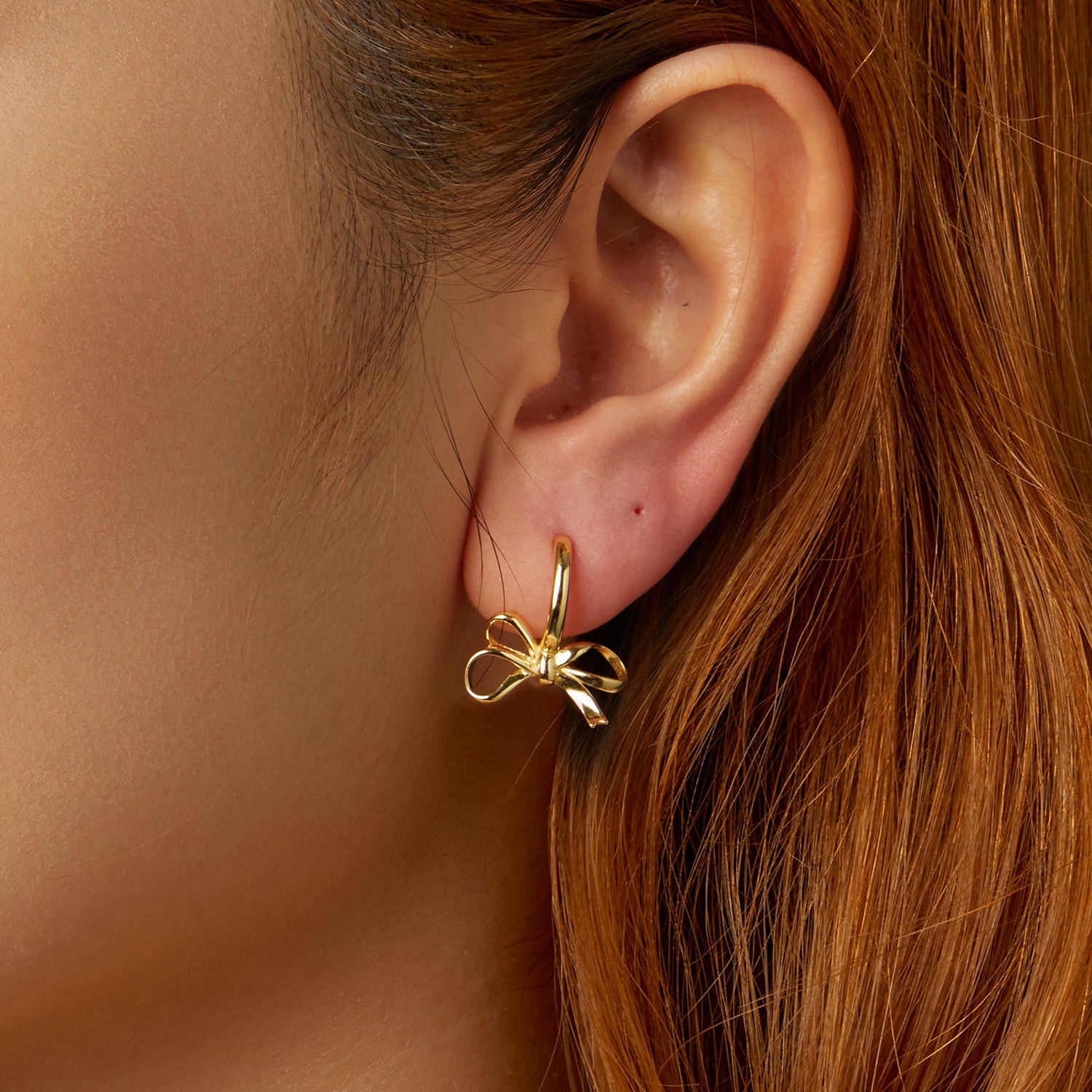 Gold Dangly Bow Earrings
